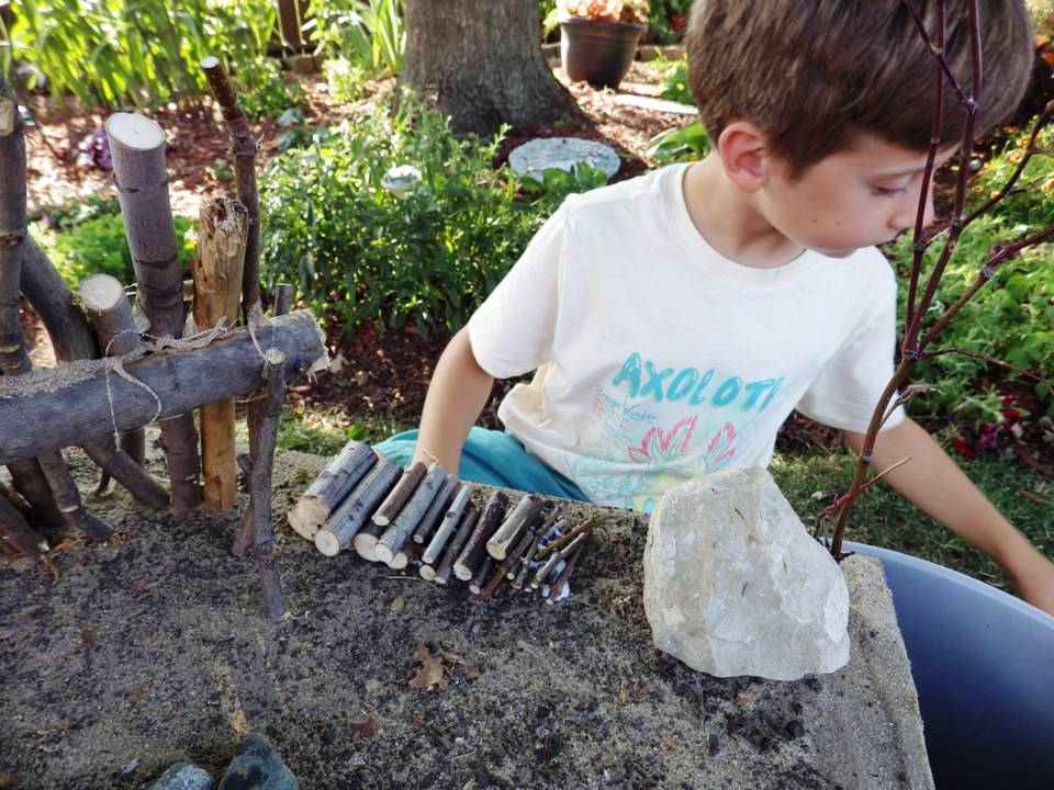 BOY WORKING ON DIORAMA