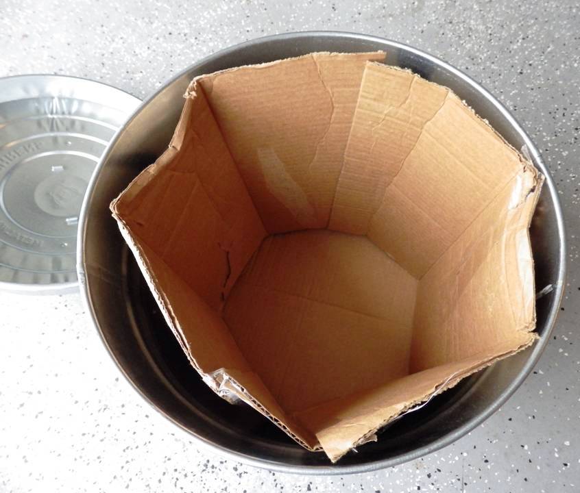 CARDBOARD ON SIDES OF CAN