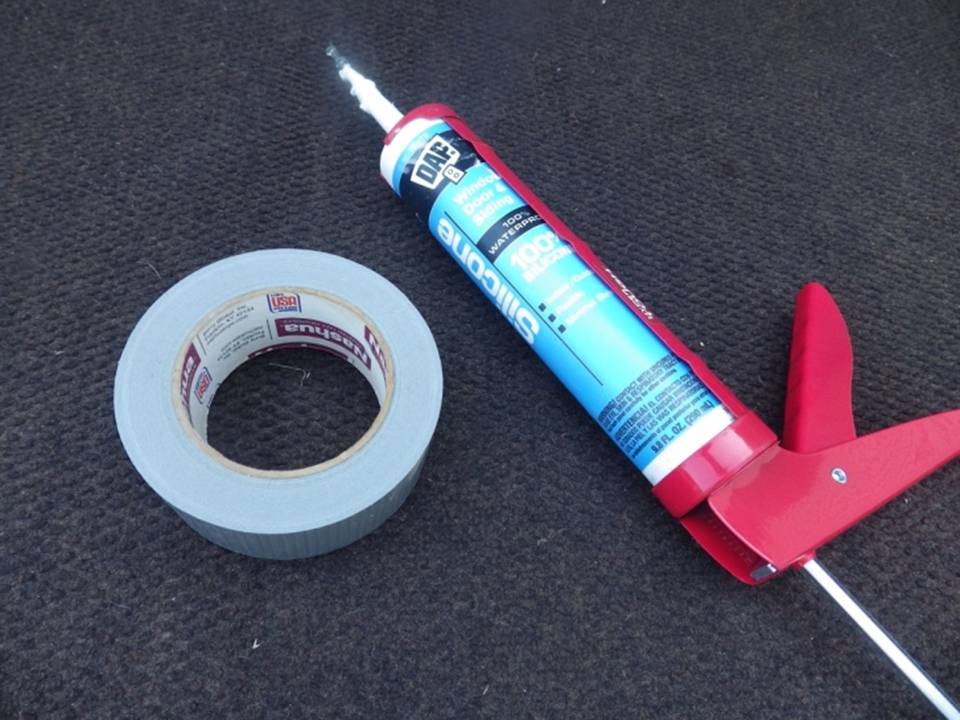DUCT TAPE AND CAULK GUN