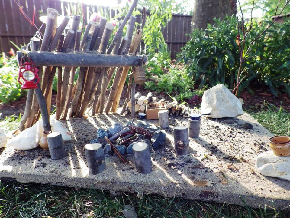 SUNLIGHT ON MINIATURE CAMPSITE