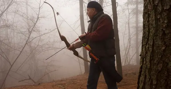 Bowhunter in Wilderness