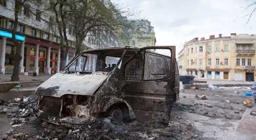 Burned Car after Civil Unrest | How To Defend Your Apartment From Looters After The SHTF