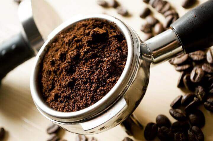 Coffee Grounds in Scoop
