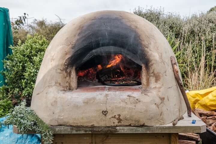 Earth Oven With Pizza