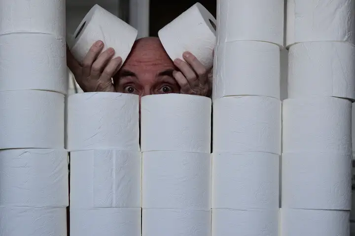 Guy Behind Wall Of Toilet Paper
