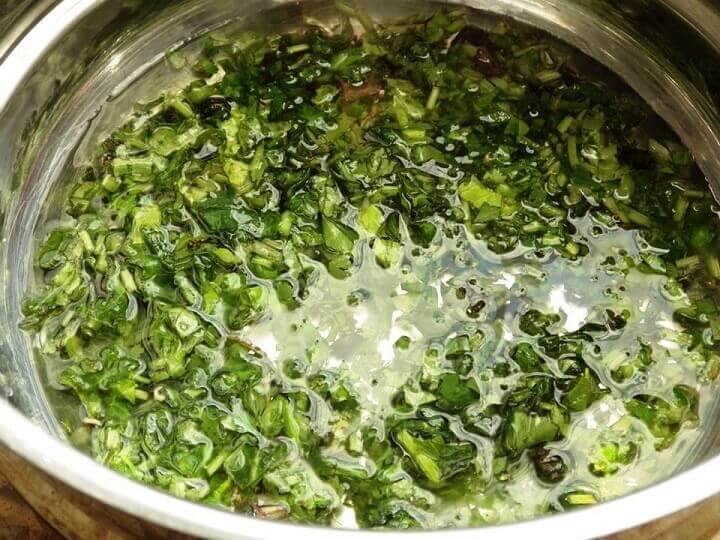 Herbs in Oil in Double Boiler
