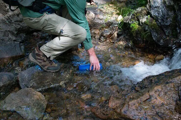 Hiker Gathering Water