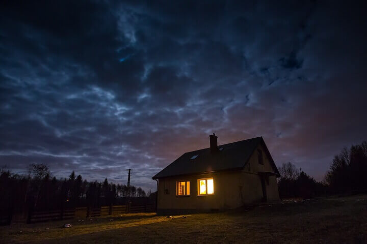 House With Light On At Night