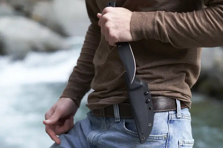 Man Holding Survival Knife