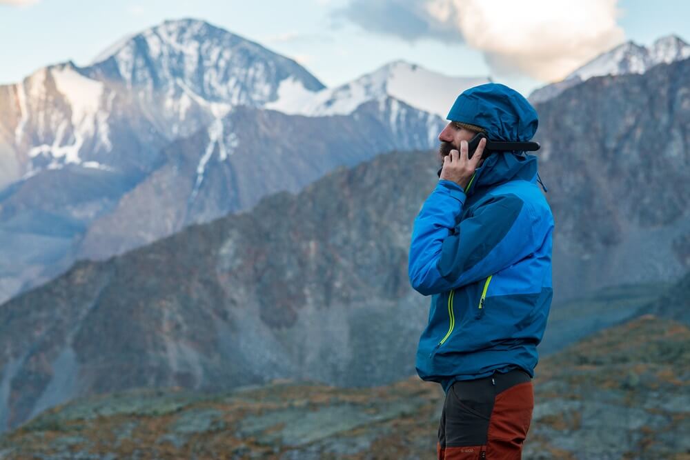 Man Talking on Satellite Phone