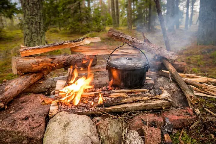 Pot Over Campfire In The Forest