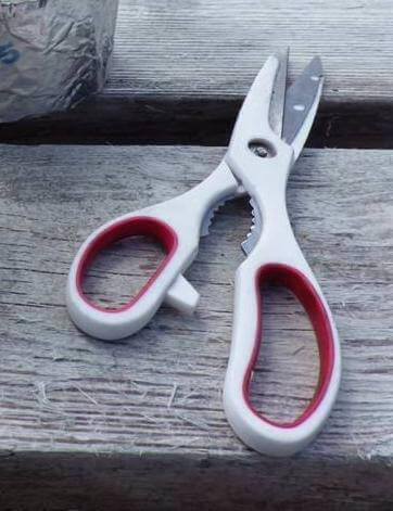 Scissors On Wood Table