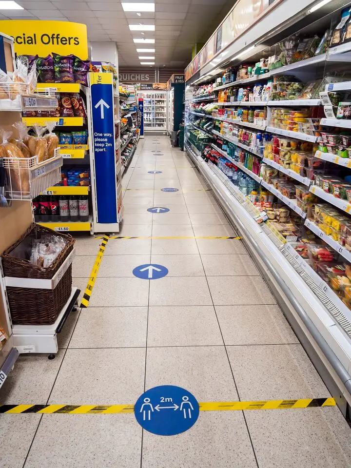 Social Distancing Signs In Grocery Store