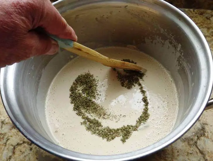 Stirring Herbs into Soap