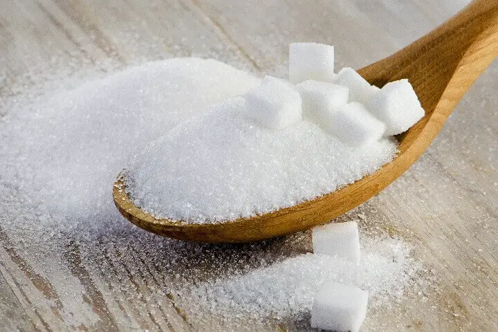 Sugar and Cubes in Spoon