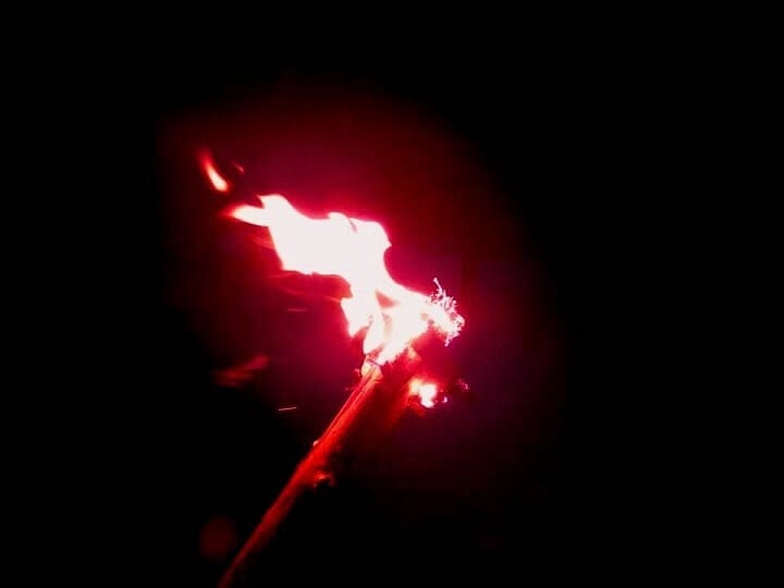 Torch Lit At Night