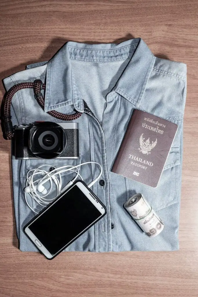 Travel Items On Folded Shirt