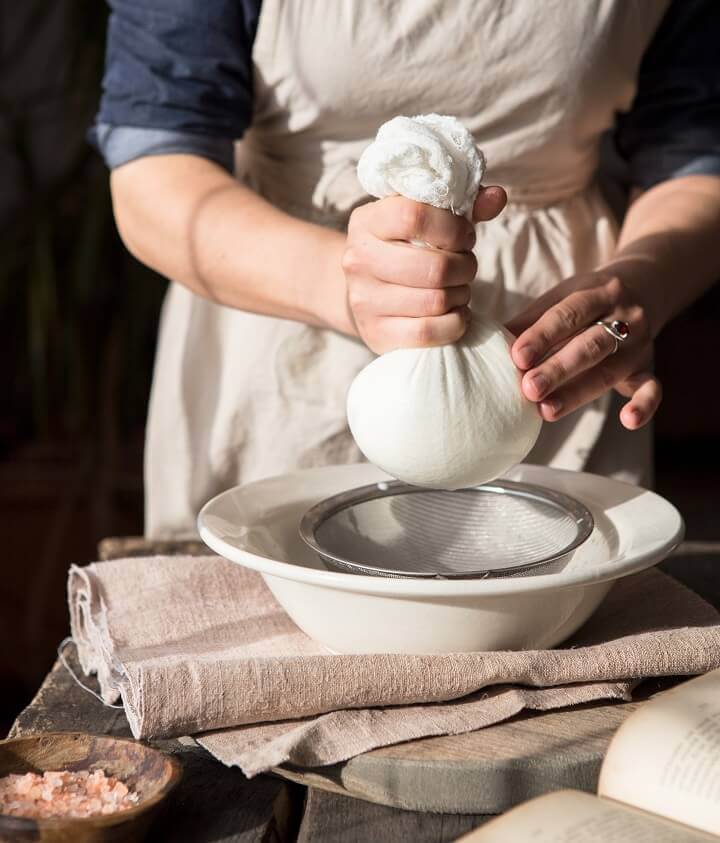 Woman Making Cottage Cheese