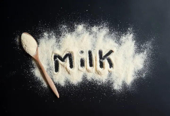 Word Milk Drawn in Powdered Milk
